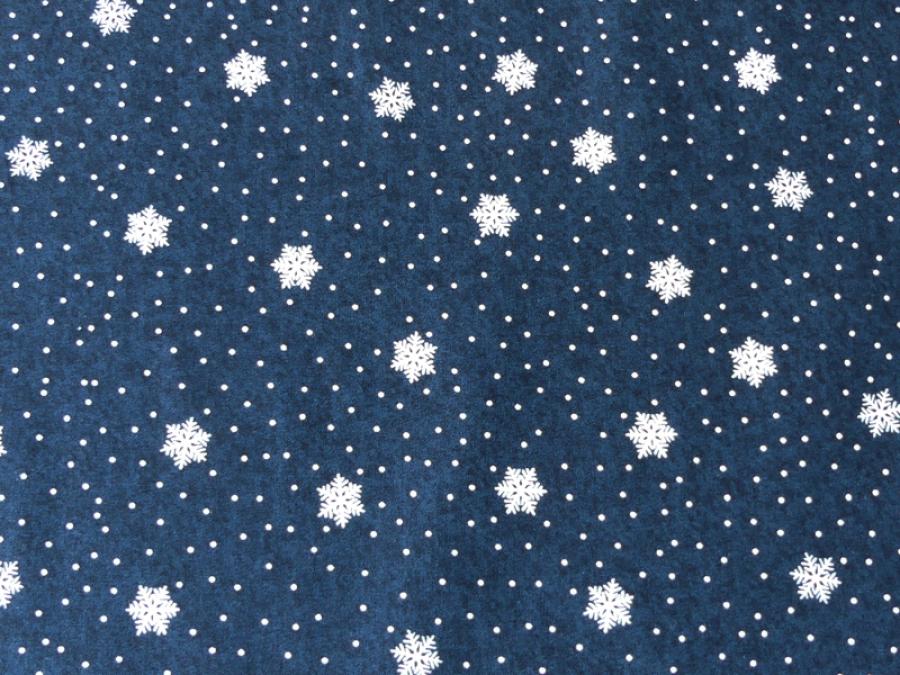 Patchworkstoff Schneesterne, blauer Untergrund Detailansicht